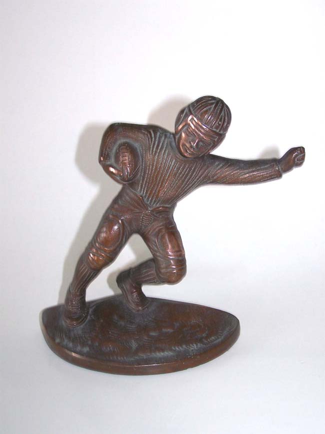 A pair of Antique Cast Iron Bookends depicting a Football Player from the 1920's. — image 2